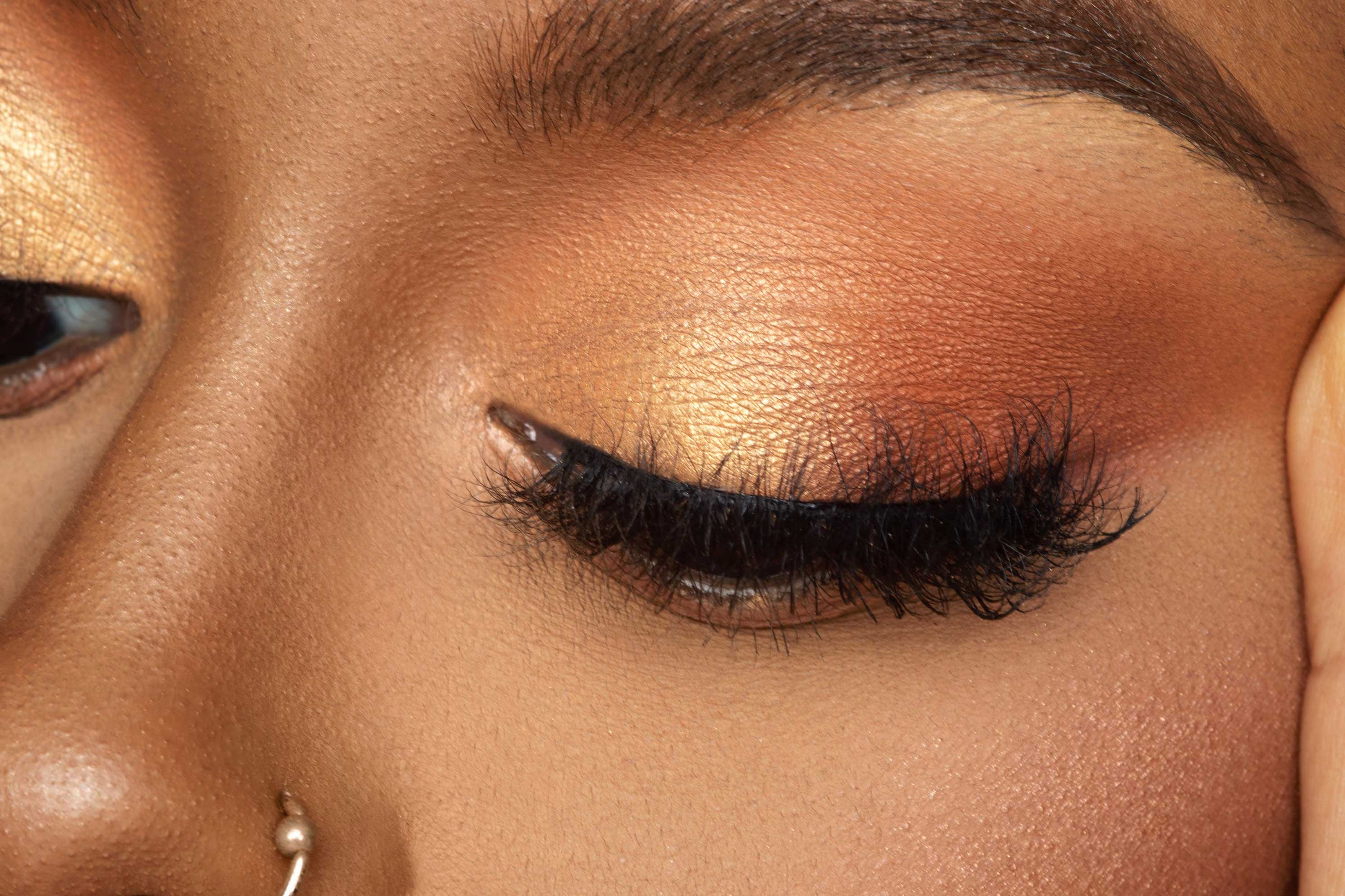 Model wears Bronze Lookbook eyeshadow palette using shade spice, quid, glow up, terracotta